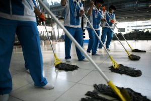 BANGKOK, THAILAND - DECEMBER 03:  Thai workers clean the floor at Suvarnabhumi International Airport after the end of the seige on December 3, 2008 in Bangkok, Thailand. Yesterday, a court dissolved Thailand's top three ruling parties for electoral fraud, banned the prime minister from politics for five years and thus brought down a government that has faced months of protests. Deputy Prime Minister Chaowarat Chanveerakul will become the caretaker prime minister. The on-going political crisis during the holiday season stranded 300,000 foreign tourists, paralysing Thailand's lucrative tourist industry.  (Photo by Chumsak Kanoknan/Getty Images)